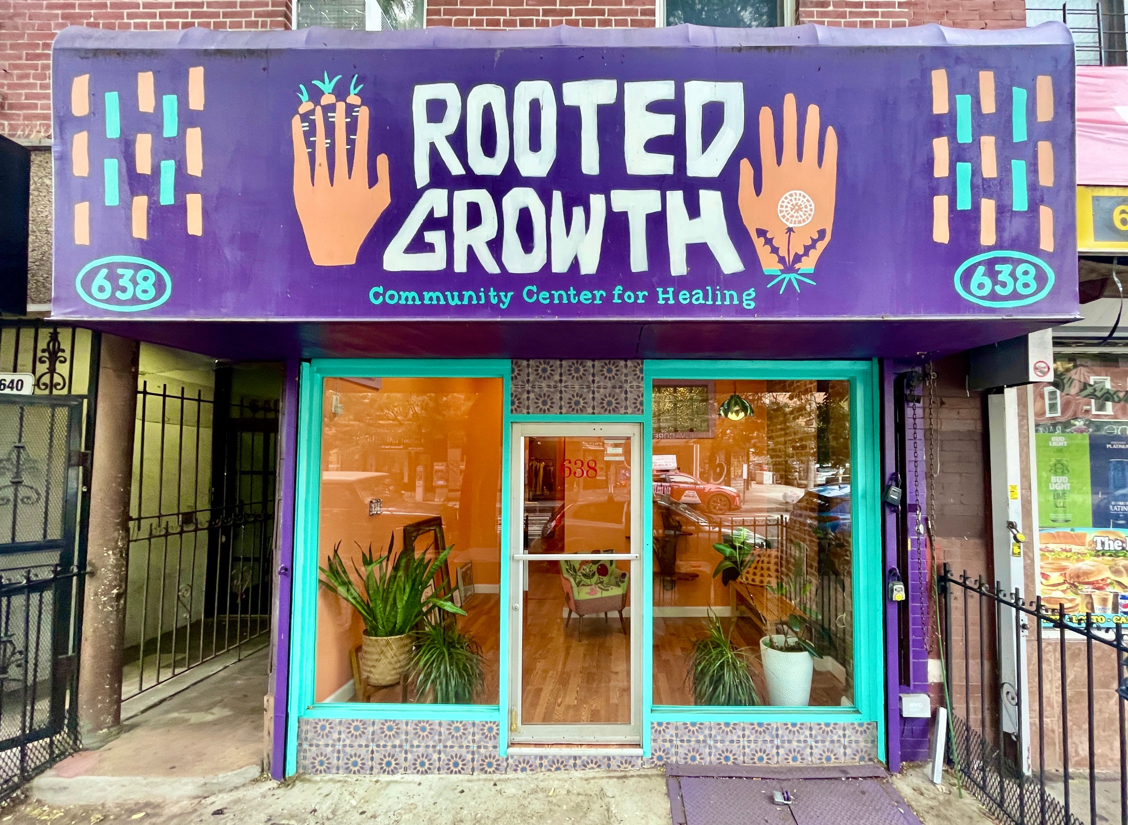 Front of the Rooted Growth space with colorful signage